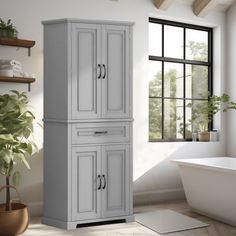 a bathroom with a bathtub, sink and cabinet in it's corner next to a window