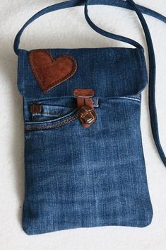 a denim bag with a heart on it