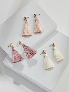 olive + piper Mini Tassel Statement Earrings  #tasselearrings #tassels Casual Basics, Pearl Cluster, Back In Stock, Simple Elegance, All Colors, Chandelier Earrings