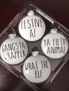 three glass ornaments that say festive af and what the flier is in them