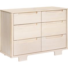 a white wooden dresser with four drawers