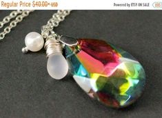 EASTER SALE Crystal Rainbow Necklace. Rainbow Teardrop Necklace. Rainbow Crystal Necklace with Wire Wrapped Teardrop and Pearl. Crystal Pend by TheTeardropShop from The Teardrop Shop. Find it now at https://ift.tt/2OePLLv! Handmade Crystal Necklace, Clear Crystal Necklace, White Flower Earring, Crystal Pen, Crystal Rainbow, Fairy Necklace