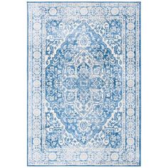 a blue and white rug with an ornate design on the bottom, in front of a white background