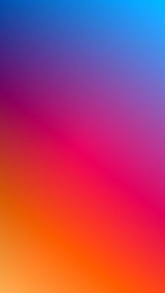 an orange and blue background with blurry colors