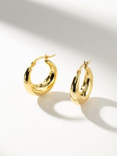 Rare Hoop Earrings | Gold | Product Image | Uncommon James Classic Brass Hoop Earrings, Uncommon James Earrings, Chic Tarnish-resistant Gold Hoop Earrings, Vintage Gold Hoop Earrings In Brass, Holiday Party Jewelry, Uncommon James, Tube Hoop Earrings, Luxury Tarnish-resistant Brass Hoop Earrings, Statement Hoop Earrings