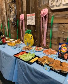 a table topped with lots of different foods