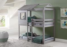 a child's bedroom with bunk beds and green walls