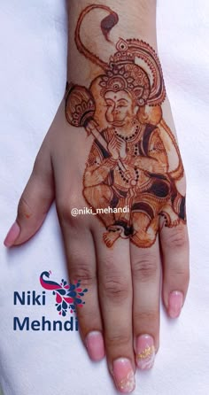 the hand is decorated with hendi designs and an elephant on it's palm