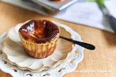 a cupcake sitting on top of a white plate