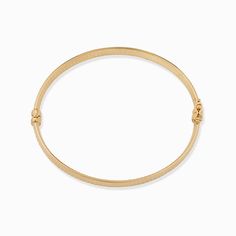 Inspired by the Grand Prix of Monaco, our Moto Bangle exudes style. Featuring a wide, flattened solid gold tube, it is hand etched with a vintage design that offers a classic yet modern look. The Finer Points: Metal: 14 Karat Yellow Gold Dimensions: 8mm Wide Tube, 60mm Diameter Weight: 7.4 Grams Construction: Latch with Figure Eight Closure Origin: Crafted in Arezzo, Italy Classic Yellow Gold Band Bracelet, Classic Bracelets With Decorative Band For Formal Occasions, Elegant Gold Band Cuff Bracelet, Heirloom Style Polished Gold Bangle, Classic Gold Band Bracelet, Elegant 14k Gold Bracelets With Decorative Band, Classic Formal Bracelets With Decorative Band, Elegant Yellow Gold Bracelets With Decorative Band, Elegant Gold Band Bangle