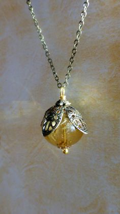 Dandelion  necklace  Amber color  glass orb by DancingEyeJewels, $22.50 Floral Terrarium, Dandelion Necklace, Terrarium Jewelry, Glass Orb, Dandelion Seed, Jewelry Nature, Chain Top, Flower Tops, Amber Color