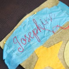 a piece of paper that has been made to look like a fish with writing on it