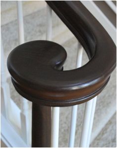 a close up view of a stair railing