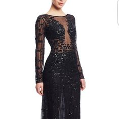 Long Sleeve All-Over Beaded Gown. Size Us 6. Glamorous Formal Gown With Sheer Bodice, Black Sequin Gown For Formal Events, Black Sequin Evening Dress For Formal Occasions, Black Sequined Evening Dress For Formal Events, Black Cocktail Gown With Sheer Bodice, Black Gown With Sheer Bodice For Cocktail, Formal Black Evening Dress With Sequins, Luxury Cocktail Gown With Sheer Bodice, Luxury Black Gown For Night Out