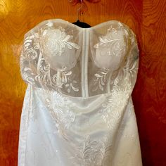 Ordered This On Amazon, Just Wasn’t Exactly What I Thought I Wanted. Tried On Once, Never Worn. Dress Is Ivory, Not Stark White. Thick Satin Lower Layer With 4 Layers Of Tulle Overlay. Sheer Bodice With Boning In Bodice. Small Sequin Detail On Top Half. Sweetheart Neck Line With Cups. Thick Beautiful Lace Through Out. Mermaid Style. Ordered A 18 Fits More Like 14/16. Has Small Train. White Lace Gown With Sweetheart Neckline, White Illusion Neckline Wedding Dress, White Wedding Dress With Sweetheart Neckline And Fitted Bodice, Bridesmaid Gown With Sheer Bodice In White, White Strapless Wedding Dress For Bride, White Wedding Dress With Sheer Bodice For Bridesmaid, White Gown With Lace Bodice And Sweetheart Neckline, White Bridesmaid Gown With Boned Bodice, White Bridal Dress With Lace Bodice