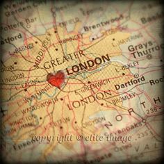 a map with a red heart on it and the word london written in black ink