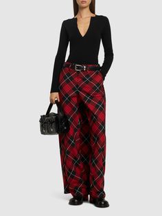 Front skirt panel with side button closure. Belt loops. All over pattern placement may vary. Two back pockets. Model is wearing a size36 Tartan Pants, Versace Brand, All Over Pattern, Ski Accessories, Loafer Mules, Mule Sandals, Sports Accessories, Paul Gaultier, Flat Espadrilles