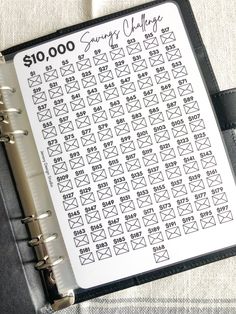 a binder that has some writing on it with the words $ 10, 000 written in