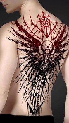 the back of a man's chest with an artistic tattoo design on his body