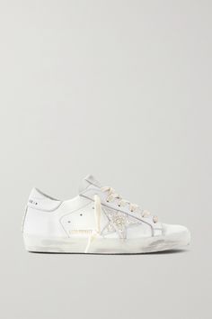 EXCLUSIVE AT NET-A-PORTER. Made in Italy from white leather, Golden Goose's 'Superstar' sneakers have been carefully hand-distressed by artisans in the brand's Venetian atelier - so while this pair looks love-worn, it feels brand new. They're embellished with lustrous faux pearls filling in the signature star. White Sneakers Designer, Clean Golden Goose Sneakers, Golden Goose With Wedding Dress, Pearl Golden Goose, Golden Goose Wedding Shoes, Wedding Golden Goose, Fancy Sneakers, Wedding Shoes Sneakers