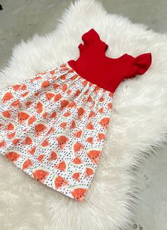 "Red stretchy knit top with watermelon slices woven bottom. Pattern placement does vary! Please Note: All items in my shop are custom made, There are no refunds, exchanges or returns. All sales are final. The dress is true to size, knee length. Made to order. The dress runs true to size but I also have the measurements to check them before purchasing. Aprox. measurements size/chest/length NB/6.5\"/12\" 3m/7\"/14.5\" 6m/8\"/16\" 12m/8.5\"/17.5\" 18m/9\"/19\" 2t/10\"/20.5\" 3t/10.5\"/22\" 4t/11\"/ Fitted Summer Birthday Dress, Summer Birthday Cotton Dress, Red Summer Dress For Birthday, Cute Stretch Summer Dress, Casual Short Sleeve Dress For Birthday, Casual Short Sleeve Birthday Dress, Fitted Fruit Print Summer Dress, Cute Summer Dresses With Fruit Print, Cute Fruit Print Summer Dresses