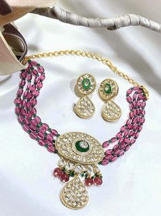 💕 A perfect piece of art with full of radiance, lot of luster and always a keeper in your jewelry trinket. Delicate Polki studded choker necklace beaded together with pink & green beads, cluster pearls & melon beads with potta stone on gold plated brass base metal, gold finish all over. Matching pair of earrings makes this choker a full set. Perfect Indian Wedding Jewelry. Great for any occasion. Style this with any Ethnic Attire. Drawstring adjustable. ✅ WHAT GOES IN 👉🏻Premium Quality raw ma Multicolor Polished Beads Bridal Necklace For Wedding, Wedding Jewelry Pendant With Polished Beads, Kundan Beaded Round Bridal Necklace, Beaded Kundan Pendant Necklace For Wedding, Beaded Chandbali Bridal Necklace Gift, Wedding Jewelry Pendant With Faceted Beads, Wedding Pendant Jewelry With Faceted Beads, Multicolor Kundan Necklace With Polished Beads For Wedding, Jeweled Kundan Necklace With Round Beads For Wedding