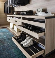 an organized closet with shoes and other items