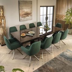 a dining room table with green chairs around it