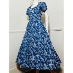 1990s vintage crisp blue cotton floral dress by Axiom. 100% cotton in a blue floral batik print. Sweetheart neckline. Padded shoulders with short sleeves. Fitted bodice. White buttons all the way down the front. Fitted waist. Very full A-line skirt. Midi length. No lining. { LABEL- FABRIC- TAG SIZE } Axiom 100% Cotton Labeled Size 8- refer to measurements { MEASUREMENTS } Shown on a 5'8" Mannequin with 33" Bust- 25" Waist- 35" Hips  NO STRETCH Bust- 40" Waist- 28" Sleeves- 5" Bodice- 16" Hips- 70" Length- 50" { CONDITION } Excellent Condition PLEASE READ BEFORE PURCHASING For best fit, please compare measurements to a garment of your own that fits comfortably and please measure yourself before completing your purchase. It is normal for humans measurements to fluctuate.  I cannot accept ret Fitted Batik Print Dress For Spring, Blue Cotton Vintage Dress For Summer, Fitted Cotton Vintage Dress For Garden Party, Fitted Vintage Dress With Short Sleeves, Blue Short Sleeve Vintage Dress For Summer, Fitted A-line Blue Vintage Dress, Fitted Cotton Vintage Midi Dress, Fitted Cotton Vintage Dress Midi Length, Fitted Cotton Midi Length Vintage Dress