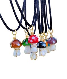 ♡ Customize your mushroom necklace by choosing your mushroom color & wire color. Each pendant is one of a kind due to each pendant being wrapped abstractly, with a 20-inch black adjustable cord. ♡ SHIPS NEXY DAY! ♡ Get your matching bracelet here: https://www.etsy.com/listing/1059435535/more-colors-mushroom-pearl-bracelet-faux?ref=shop_home_active_23&frs=1&crt=1 ♡ Instagram @lionessgems Bohemian Adjustable Necklace With Mushroom Design, Adjustable Bohemian Necklace With Mushroom Design, Wire Wrapped Mushroom, Mushroom Stuff, Mushroom Color, Cute Animal Quotes, Mushroom Necklace, Mushroom Pendant, Lapis Ring