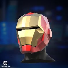 an iron man mask made out of polygonic shapes on a dark background with blue lights