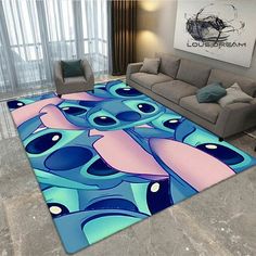 a living room area rug with blue and pink designs