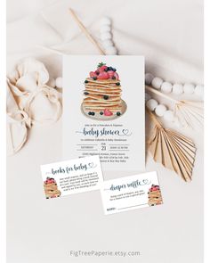 two business cards with pancakes and berries on them