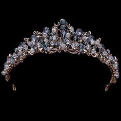 Dare this magnificent princess wedding tiara in black crystal stones on a golden zinc alloy structure. This tiara will give a romantic and unique touch to your hairstyle and wedding dress. If you have chosen a fairy tale, romantic chic or boho chic theme for your wedding then don't hesitate any longer, this tiara is made for you! And for even more custom beauty, take a look at our store! You will find a beautiful and wide range of wedding accessories such as wedding jewelry, wedding jewelry, boh Silver Crown With Blue Jewels, Light Blue Tiara, Blue Tiara, Tiara Wedding Hair, Blue Crystals Stones, Tiara Accessories, Soft Pink Theme, Crystal Tiara, Tiara Wedding