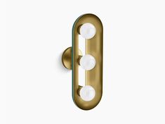 an image of a brass door handle with three lights on the front and back side