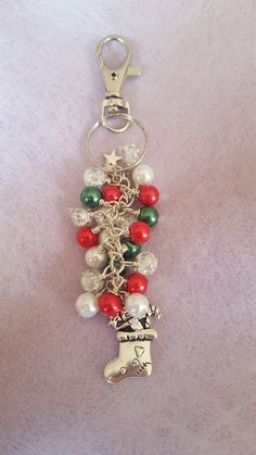 a keychain with beads and charms attached to it