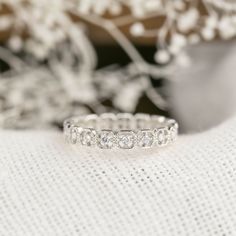 This gorgeous diamond eternity ring featuring milgrain square framed 1.5mm diamonds all around the band. The perfect antique-inspired wedding band to pair with your beautiful engagement ring. This unique wedding ring features white diamonds with milgrain hexagon frame setting to add a touch of vintage look. This beautiful ring is ideal for anyone looking for a unique wedding ring, stacking ring or to be worn alone. Full eternity (Based on size7) * Diamond detail: ≈1.5mmx17pc * Diamond total cara Asscher Cut Eternity Band With Diamond Accents For Wedding, Classic Asscher Cut Eternity Band For Wedding, Asscher Cut Diamond Eternity Band For Wedding, Heirloom Eternity Band With Prong Setting For Wedding, Heirloom Half Eternity Band, Classic 14k White Gold Eternity Band For Wedding, Classic 14k White Gold Eternity Wedding Band, Antique Inspired Wedding, Wedding Band Vintage