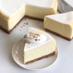 three slices of cheesecake sitting on top of a white plate next to each other