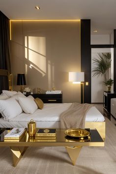 a modern bedroom with gold accents and white bedding