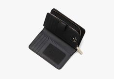 This medium wallet holds all your credit cards bills loose change i.d. receipts tickets…and it won't take up all the space in your bag. | Kate Spade Lena Medium Compact Bifold Wallet, Black Compact Kate Spade Wallets For Travel, Kate Spade Rfid Blocking Rectangular Wallet, Kate Spade Travel Wallet With Rfid Blocking, Kate Spade Travel Wallets With Rfid Blocking, Kate Spade Rfid Blocking Wallets For Travel, Kate Spade Rfid Blocking Travel Wallet, Kate Spade Black Wallet With Interior Card Slots, Kate Spade Outlet, Loose Change