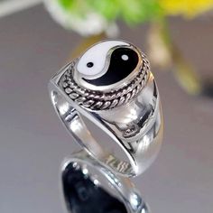 A Perfect Blend Of Elegance And Symbolism, Crafted To Offer Both Style And Meaning. Each Ring Features The Iconic Yin-Yang Symbol, Representing The Balance And Harmony Between Opposing Forces. Made From High-Quality Sterling Silver, These Rings Exhibit A Brilliant Shine And Durability, Making Them Suitable For Everyday Wear Or Special Occasions. Whether You're Looking To Make A Fashion Statement Or To Carry A Deeper Spiritual Significance, Ying Yang Sterling Silver Men's Rings Are An Ideal Choic Adjustable White Symbolic Rings, Yin Yang Ring, Balance And Harmony, Sterling Silver Mens Rings, Men Ring, Ying Yang, Mens Silver Rings, Mens Accessories Jewelry, Sterling Silver Mens