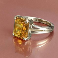 "Yellow Sapphire 5.3 ct stone Ring Handcrafted Indian jewelry. Ring is in .925 Sterling Silver and finished with Rhodium EXCELLENT GIFT: for birthday, anniversary, holidays, stocking stuffers, graduation, Christmas, Valentine's Day, Mother's Day, Thank You or simply \"Thinking of You ALL RING SIZES AVAILABLE: We have our own manufacturing unit. We can deliver all custom ring sizes on request. CONTACT US: If you have any question, please post into \"Customer Questions & Answers\" below the \"Product specifications\". Product colour may slightly vary due to photographic lighting sources or your monitor settings. Top Quality Craftsmanship Exceptional Styling ENTER OUR SHOP HERE for more fabulous jewelry :  https://www.etsy.com/in-en/shop/JwellsFarms?ref=seller-platform-mcnav" Custom Ring, Handmade Jewelry Gift, Ring For Men, Fabulous Jewelry, Ring Sizes, Yellow Sapphire, Jewelry Ring, Photographic Lighting, Stone Ring