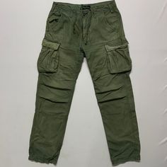 [DESCRIPTION] Please read the description first before buy my items‼️‼️‼️ Vintage Dog House Utility Multipocket Tactical Cargo Pants All in good condition [MATERIAL] Cutton [MEASUREMENT] Measurement ( WHEN LAID FLAT ): Waist: 31 inch (recommended) Insean: 29.5 inch Length: 39.5 inch Front Rise: 10 inch Thigh: 20 inch Opening Leg: 15 inch [CONDITION] - All in good condition  - No hole no stain [PAYMENT & NOTICE] - We accept PayPal ONLY - No return/refund - All items will be post over shipping com Tactical Cargo Pants, Vintage Dog, Dog House, Cargo Pants, Mens Jeans, Bathing Beauties, Mens Outfits, Pants, Music Clothes