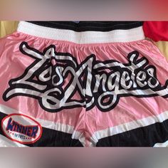 New With Tags Size Small Front Is Plain The Back Of The Shorts Says “Los Angeles” They Are A Bit See Through Brand Is Romwe Pink Sports Bottoms With Graphic Print, Pink Sports Shorts With Graphic Print, Pink Sporty Bottoms With Graphic Print, Sporty Pink Graphic Print Bottoms, Sporty Pink Bottoms With Graphic Print, Pink Letter Print Bottoms For Streetwear, Pink Bottoms With Elastic Waistband For Streetwear, Pink Casual Shorts With Graphic Print, Pink Graphic Print Pants For Streetwear