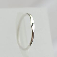 This Initial ring is a cool minimalist piece to add to your stacking set. It is made with a skinny but sturdy band with a hand stamped initial.The ring is 1.2 mm thick and looks very dainty on the finger.*** Customization *** - by default the letter will be LOWER case and oxidized to BLACKApart from the letter you also can customize the initial look. I can make it oxidized to black as you can see in pictures or leave it silver. I also can use lower case or upper case letters. Just let me know th Upper Case Letters, Initial Ring, Lower Case, Upper Case, Slovakia, Lowercase A, Stackable Rings, Engagement Ring Settings, Silver Band