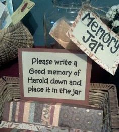 there is a sign that says please write a good memory of harold down and place it in the jar