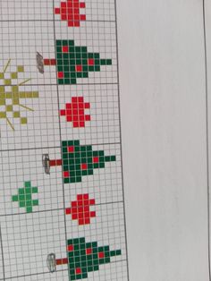 the cross stitch pattern is being worked on