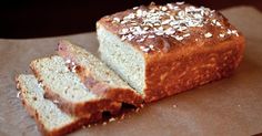 a loaf of bread sitting on top of a piece of wax paper