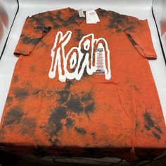 Korn Logo Tie-Dye T-Shirt Medium Sometimes You Just Want To Rep Your Favorite Band With A Logo Tee. This One Kicks It Up A Notch With A Tie-Dye Wash. Add This Tee To Your Korn Merch Collection Today. Please Note: Wash Pattern May Vary. * 100% Cotton * Wash Cold; Dry Low * Imported * Listed In Men's/Unisex Sizes Red Band Merch Tops For Summer, Summer Band Merch Red Tops, Red Cotton Band Merch Top, Red Short Sleeve Band Merch Top, Red Band Merch Cotton T-shirt, Red Cotton Band Merch T-shirt, Red Cotton Band Merch Shirt, Red Band Merch Top With Text Print, Korn Merch