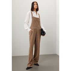 Brown corduroy (100% Cotton). Jumpsuit. Sleeveless. Square neck. Front button closure. 53" from shoulder to hemline. 31" inseam. 12.5" rise. Made in the USA. Cord Overalls, Cotton Jumpsuit, Brown Corduroy, Rent The Runway, Closet Designs, Made In The Usa, Square Neck, Overalls, Jumpsuit